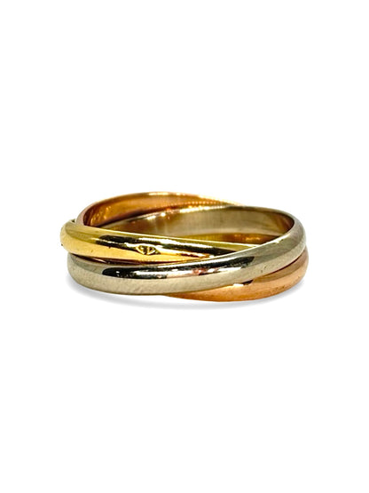 Alliance Cartier Trinity vintage en or 18 carats composée des trois anneaux entrelacés emblématiques de la collection Trinity. Ce bijou de luxe au design intemporel incarne l’élégance et le savoir-faire de la maison Cartier. Son style iconique en fait une bague idéale à porter au quotidien ou à offrir pour célébrer un engagement, un anniversaire ou une occasion particulière.