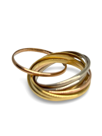 Bague Cartier Trinity Semainier en or 18 carats composée de plusieurs anneaux entrelacés au design iconique. Ce bijou de luxe allie élégance, symbolisme et savoir-faire joaillier. Appréciée pour ses lignes intemporelles et son style raffiné, cette bague Trinity Semainier constitue une pièce emblématique de la maison Cartier.